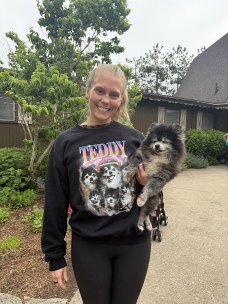 Vegan Wellness Retreats — a guest holding a fluffy dog