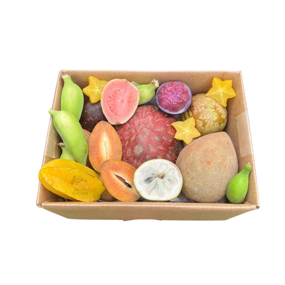 Box of freshly cut exotic tropical fruit